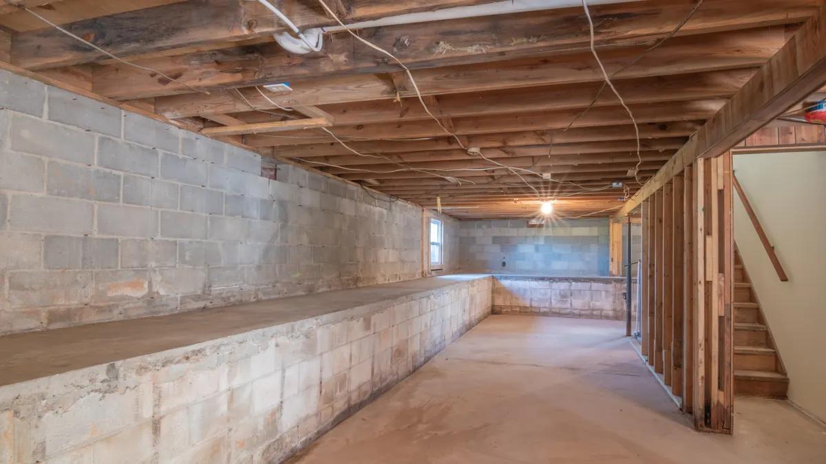 Can Interior Concrete Floors Be Levelled From the Outside? crawlspace basement with concrete foundation walls and floor